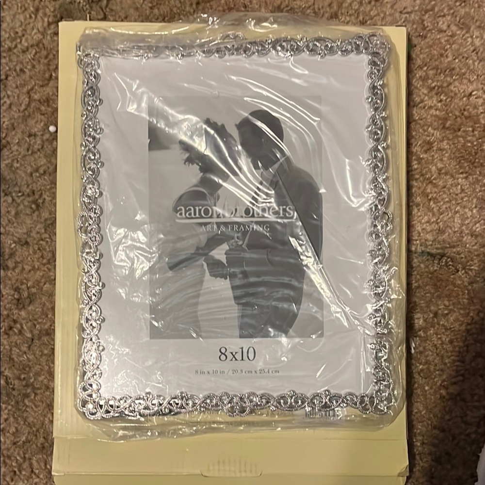 Elegant Silver Picture Frame with Intricate Design